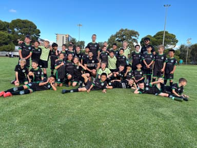 Mastery Football Academy development squad – large group of kids in black and green kit at Adelaide training session