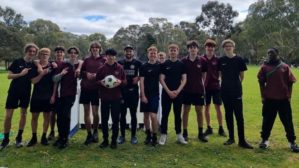 OSCH school soccer program – Mastery Football Academy coach with high school students at Adelaide after-school session