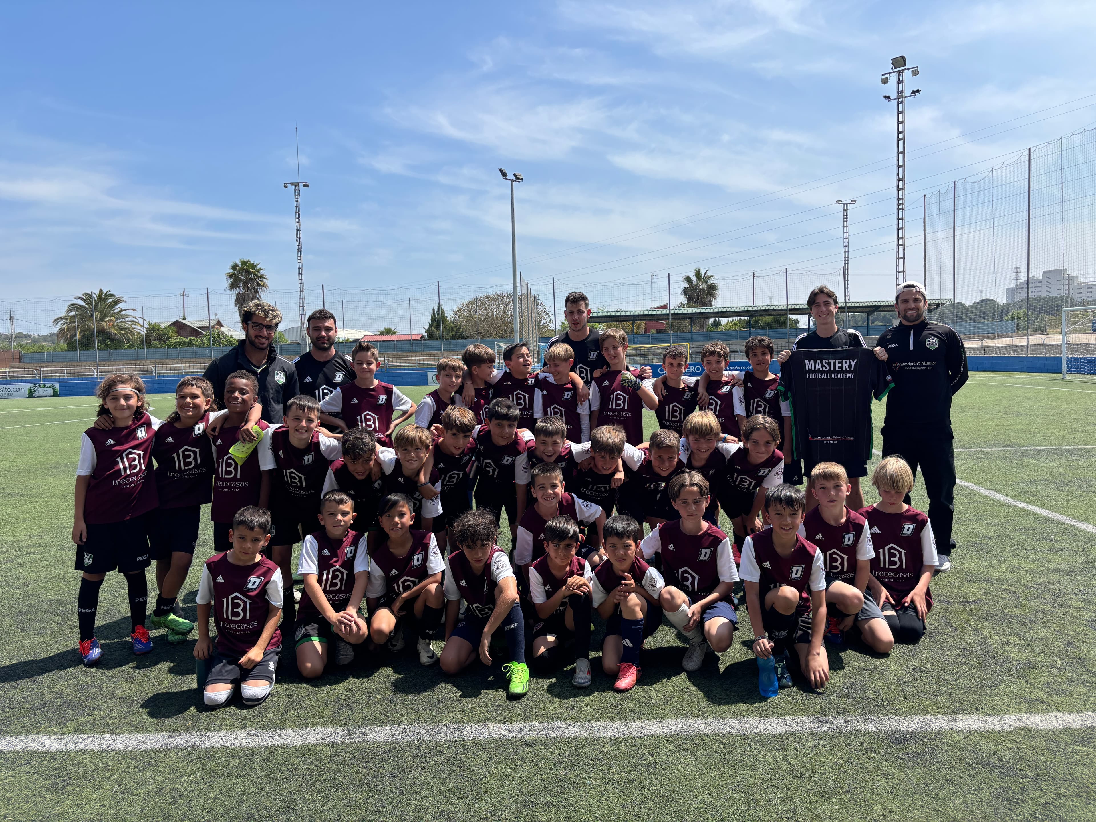 Mastery Football Academy players and coaches with a Spanish youth academy team on the pitch in Valencia — Spain Pathway tour Adelaide