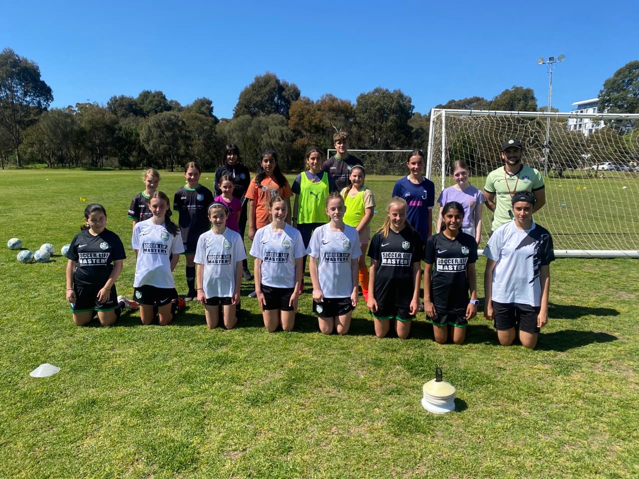 Two girls training together at Mastery Football Academy Adelaide girls football program