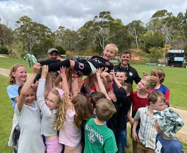 Soccer birthday party Adelaide – children cheering and celebrating at a Mastery Football Academy party